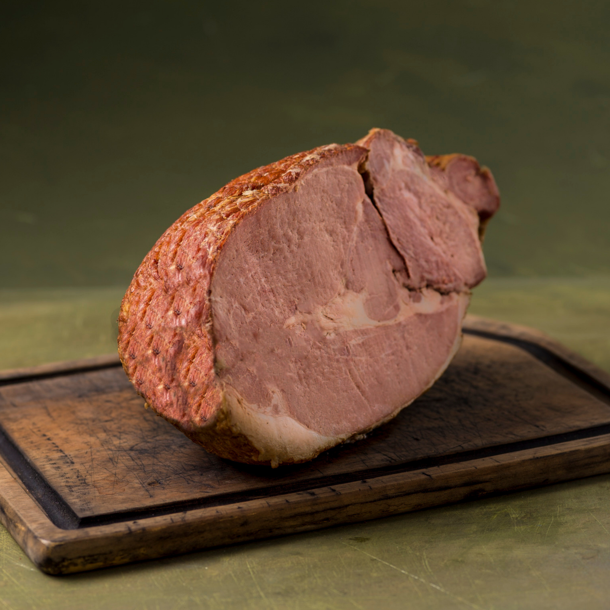 Grass Roots Farmers' Co-op Our hams are smoked low and slow over real hickory wood for 10 to 12 hours until tender. Succulent, with a slightly smoky aroma, this ham is versatile. It's a classic for brunches, lunches, and dinners at Easter, Christmas, Thanksgiving, and weddings—it's also perfect when you just need a serious ham fix. It is fully cooked and boneless for easy carving. Glaze it you want, but all you really need to do is heat and eat.