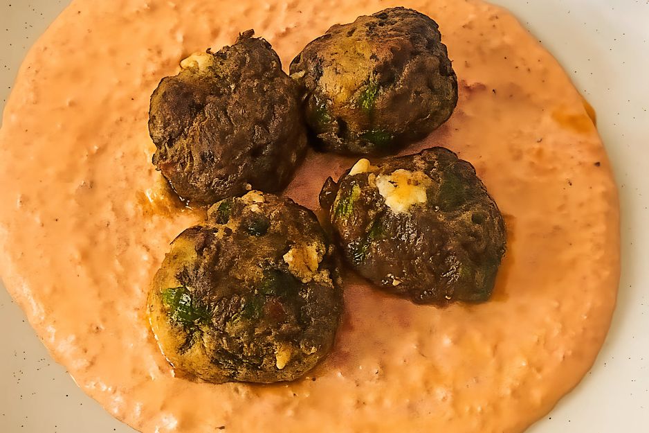 Feta Zucchini Meatballs on Roasted Red Pepper Sauce