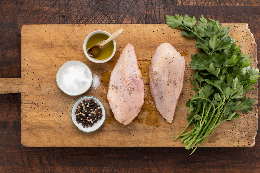 Here's Why You Should Have A Separate Cutting Board For Raw Chicken