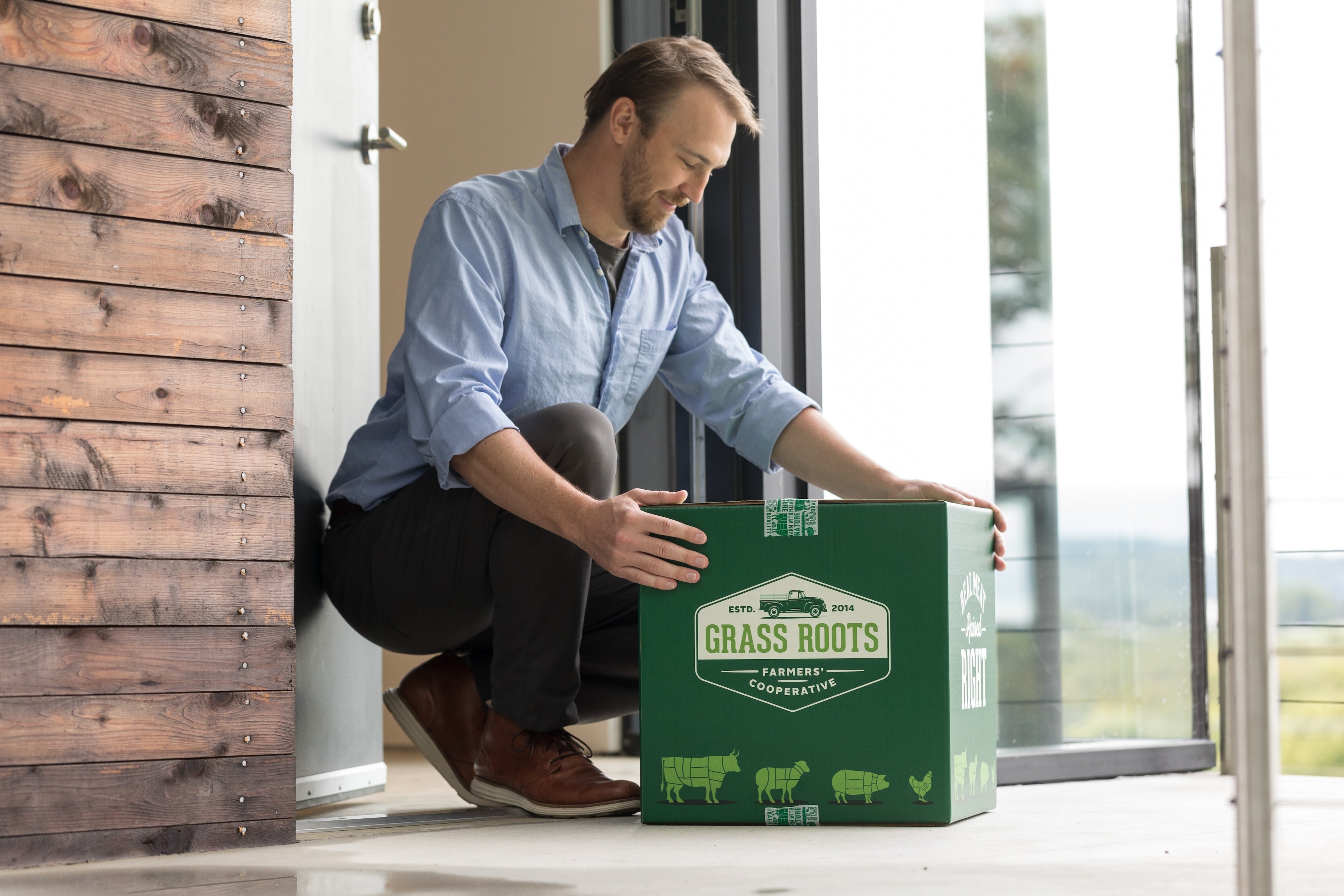 Green Grass Roots Box on Porch.jpg__PID:b928fba2-1a40-4f60-8542-206ac2cfeabb