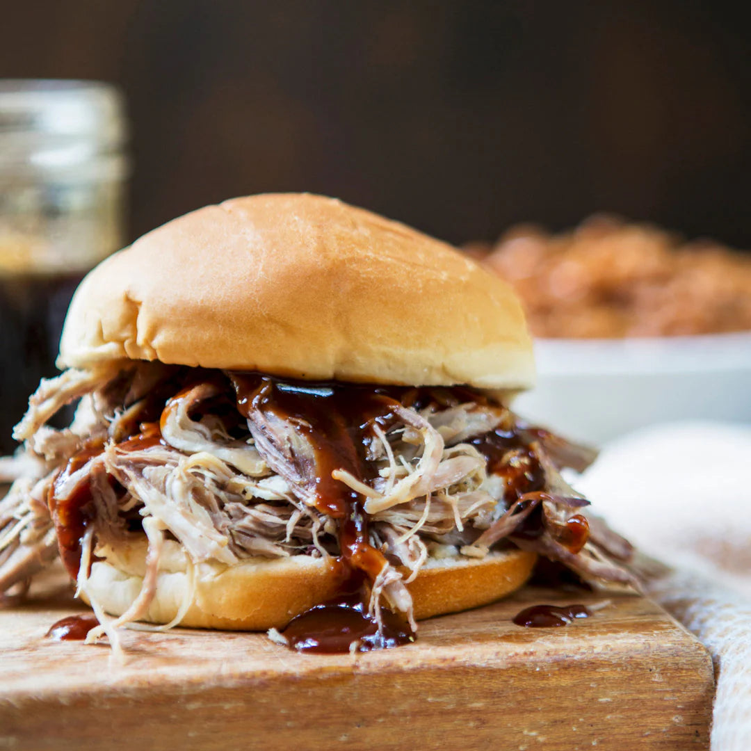 Pulled_pork_sandwich.webp__PID:e20b3af5-d2d4-4418-ae90-4922c5cb78f0