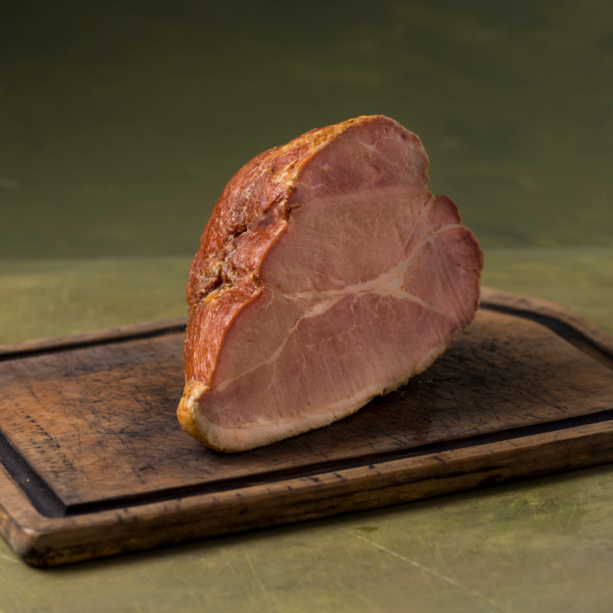 Grass Roots Farmers' Co-op Our hams are smoked low and slow over real hickory wood for 10 to 12 hours until tender. Succulent, with a slightly smoky aroma, this ham is versatile. It's a classic for brunches, lunches, and dinners at Easter, Christmas, Thanksgiving, and weddings—it's also perfect when you just need a serious ham fix. It is fully cooked and boneless for easy carving. Glaze it you want, but all you really need to do is heat and eat.